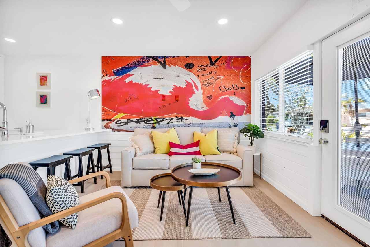 This space frames a bold framed mural that also allows an extra sleeping space