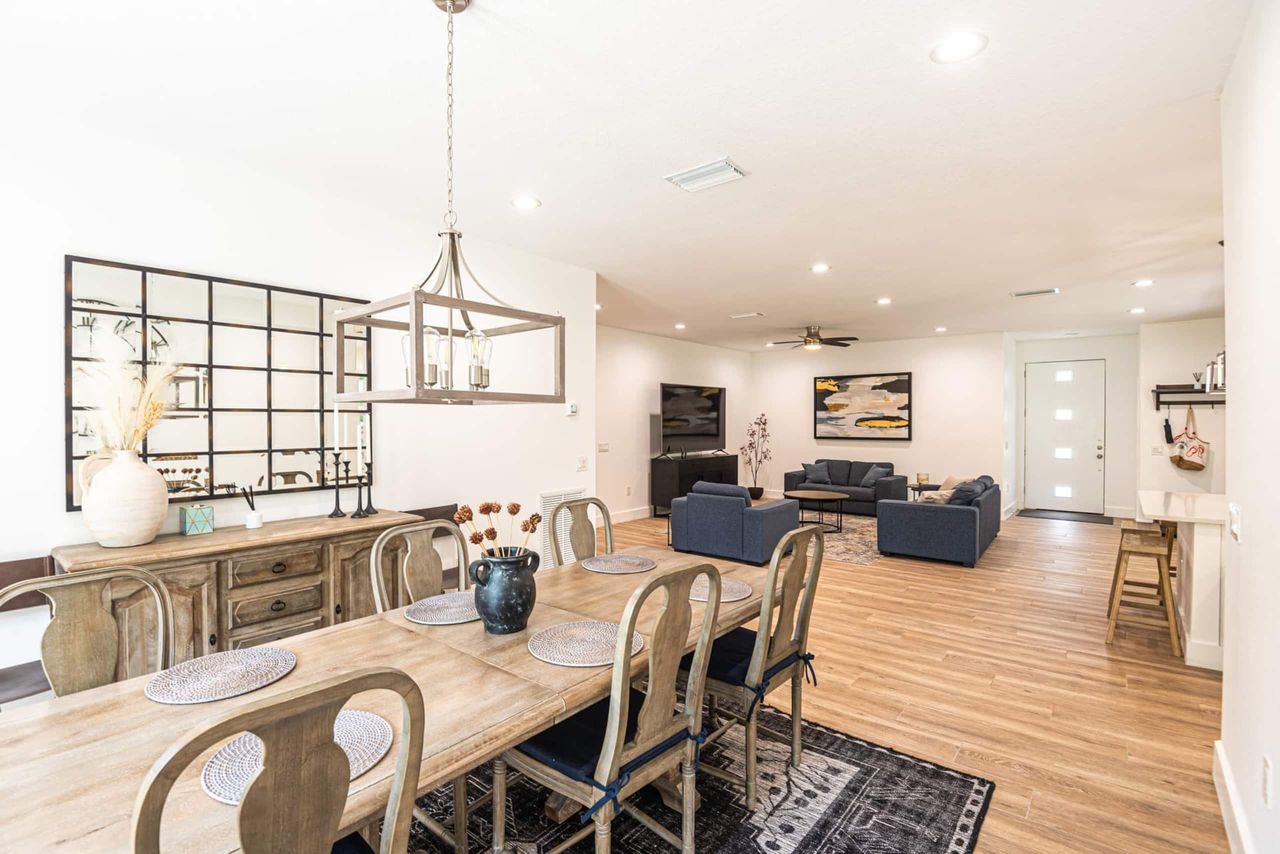 High quality dining area with space to see and talk to people in the kitchen or living room