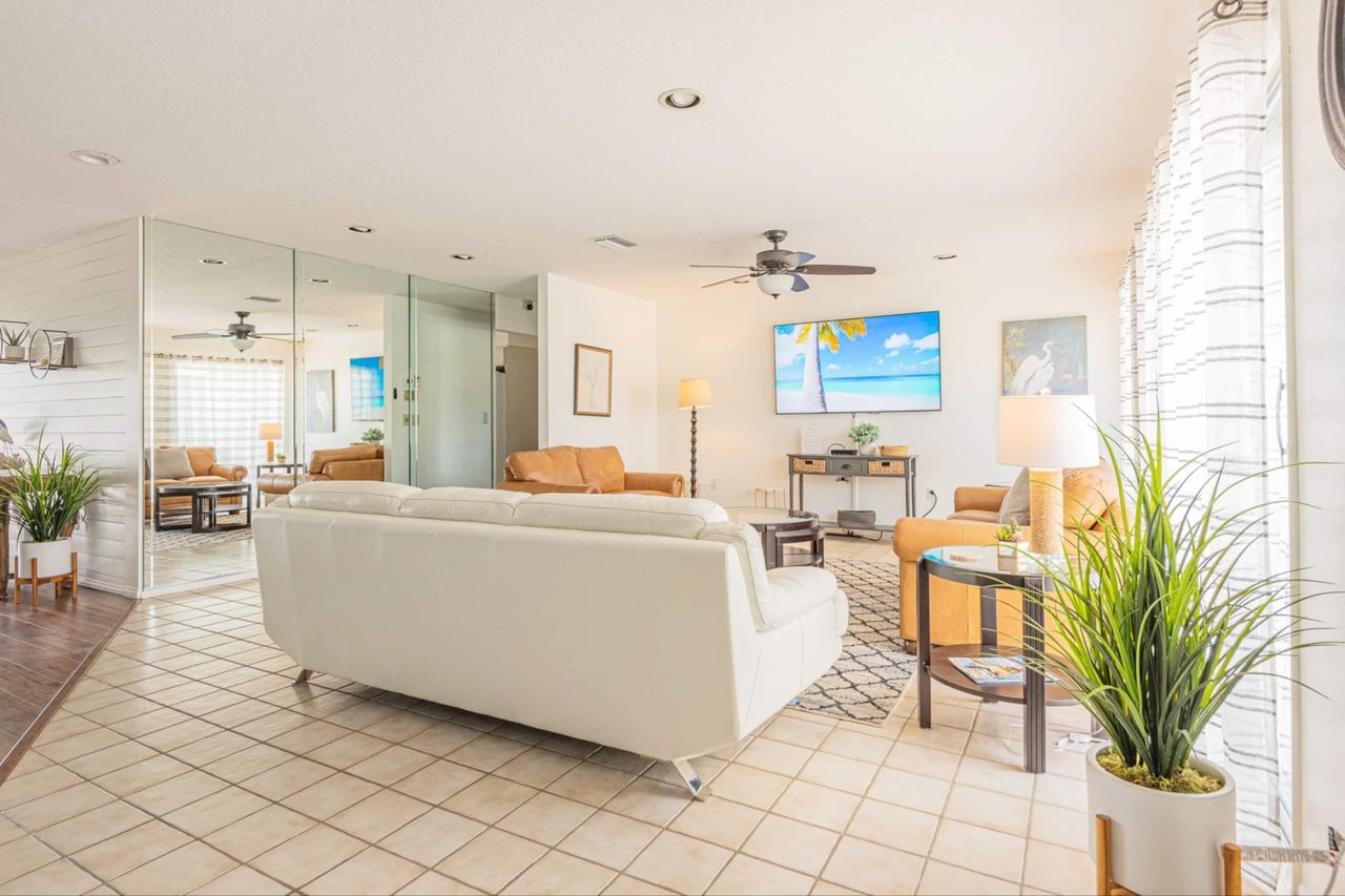 Living room area with plenty of space to lounge and watch your favorite show or engage in an interesting conversations