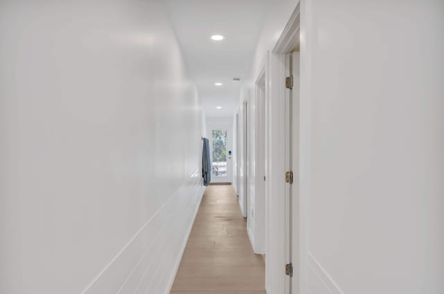 Hallway to back patio and bedrooms