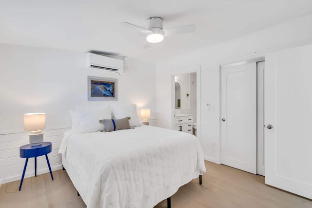 Queen bed with plush, comfortable bedding