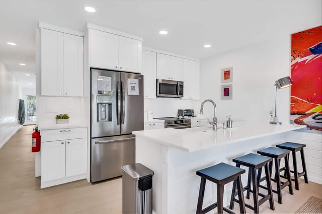 Kitchen includes all the necessary dishes, cookware, mixing bowls, appliances and bakeware for a no hassle stay.