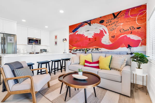Cozy and vibrant living room with pull-out sofa bed