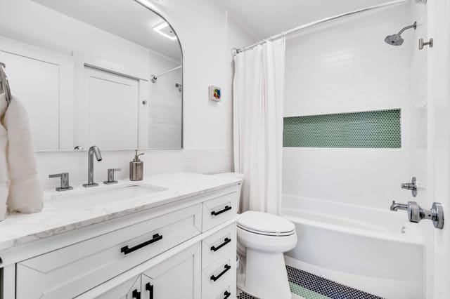 Ensuite bathroom from main bedroom with deep tub and shower.