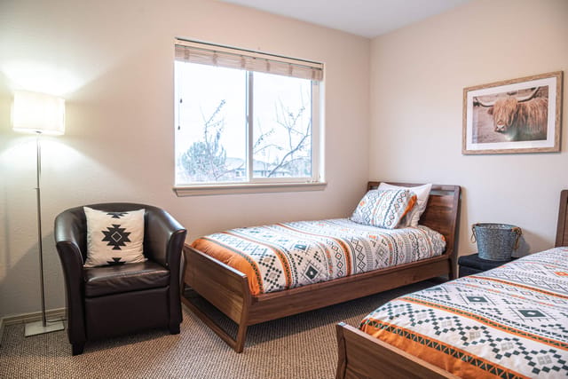 Bedroom overlooking more of beautiful Eagle crest neighborhood. Comfortable mattresses, and reading area