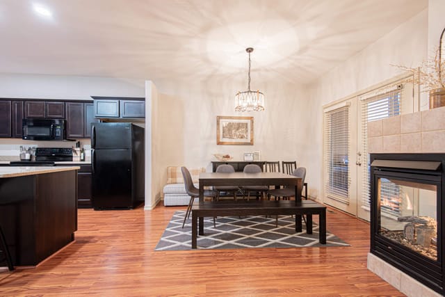 Comfortable dining area with fabric chairs and a bench for all to fit