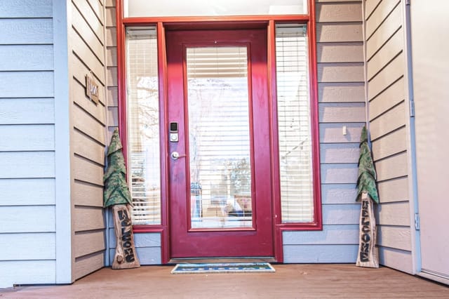 Front entrance with welcoming, locally crafted decor