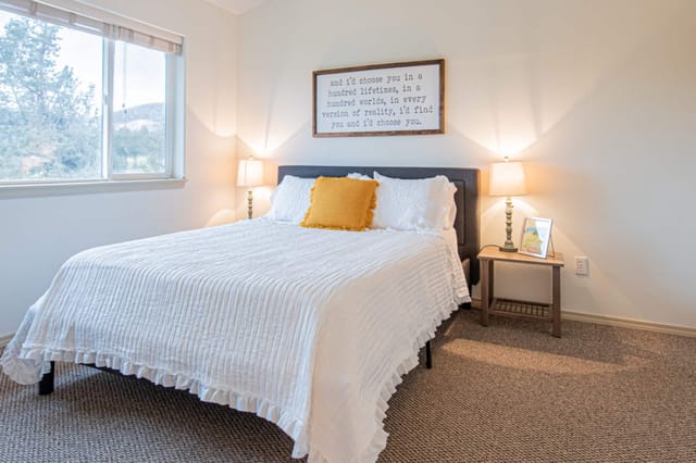 Master bedroom with high ceilings and plenty of light