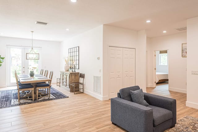 Comfortable dining seating with lots of space allowing for everyone and opening outside doors