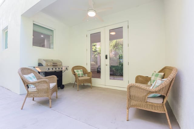 side porch with bbq and seating area
