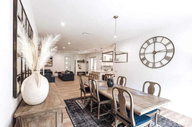 Open sun-splashed dining area with lots of space to seat 6