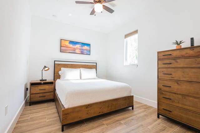 3rd Master - Contemporary coastal features throughout this bedroom with a tall dresser and a closet for your storage nee