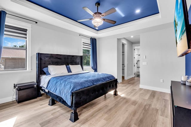 Modern master suite with lots of ventilation from the beautiful light/fan