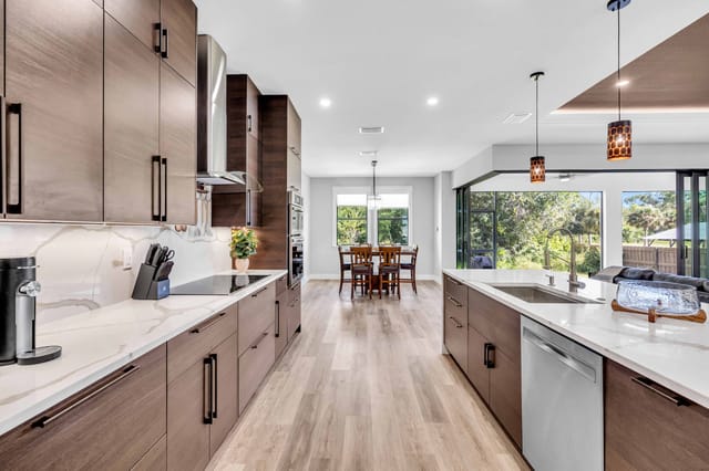 Warm dimmable bar pendants to set the mood for evening cooking