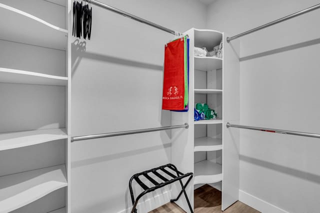 Spacious walk-in closet with folding crib for little ones
