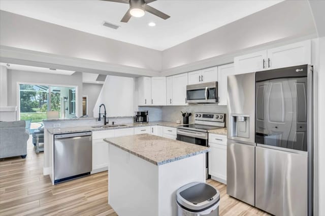 Fully stocked kitchen with a drip/pot Keurig stocked with pods and teas