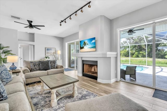 Naturally lit space with large glass windows for watching sunsets and swimmers outside
