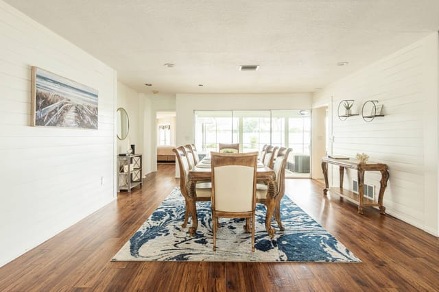 Large open space for the living room and dining room with plenty of space for large group of guests