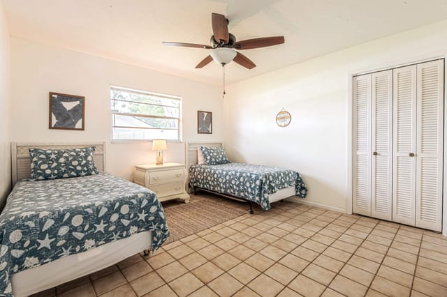 3rd Bedroom with 2 twin beds with comfy linens and plenty of space to relax