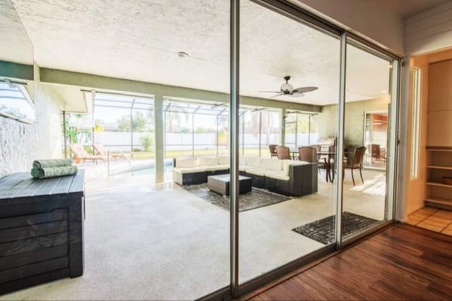 Outdoor screened lanai area with a lounge area with 60'' smart TV , outdoor dining that seats 6 (not pictured), grill an